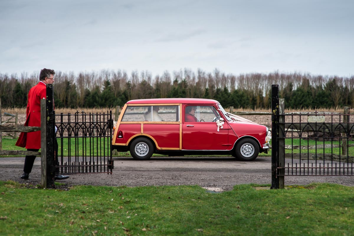 Wedding car photoraph. Mini clubman arrives at church
