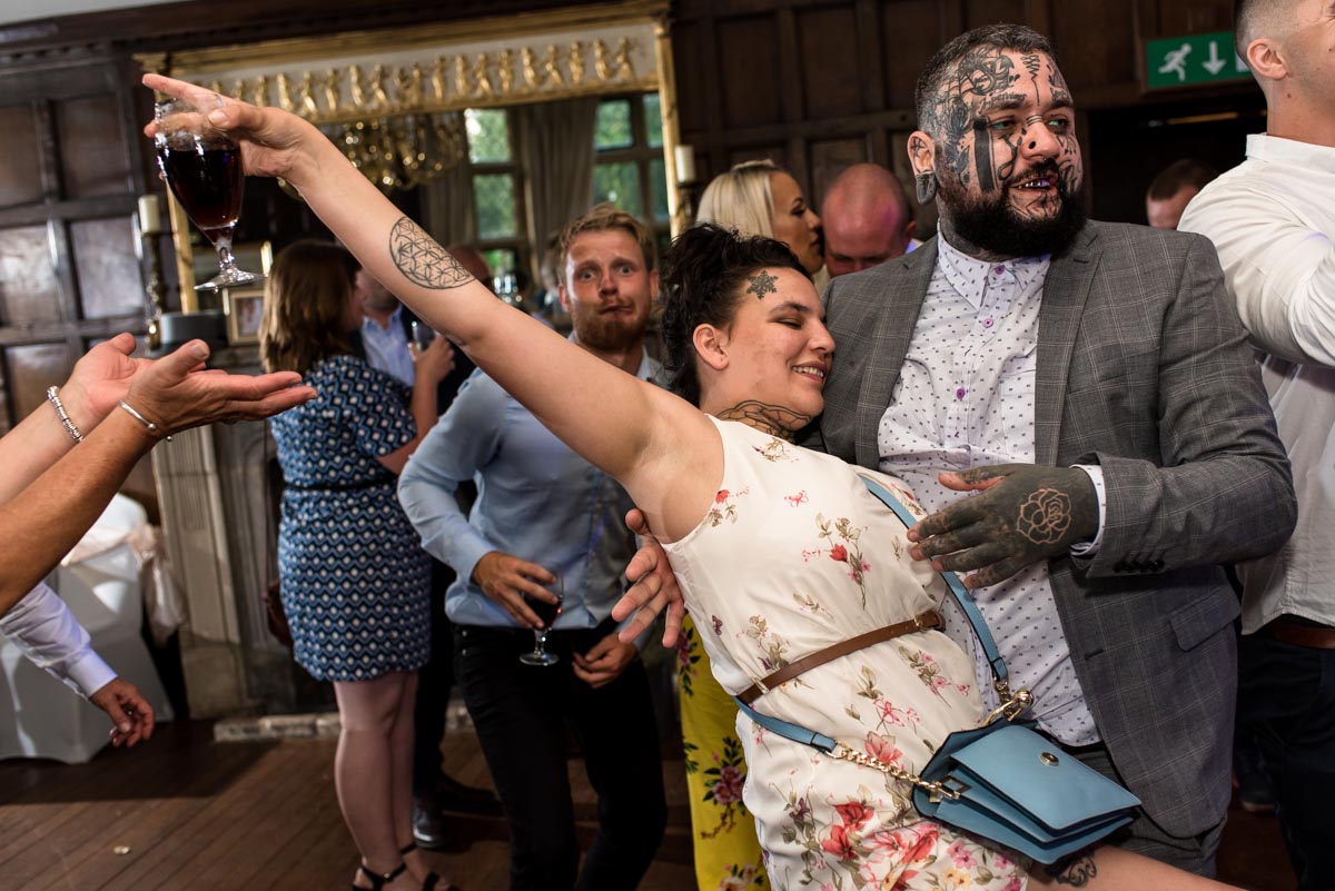 Guests enjoy wedding reception at Eastwell Manor