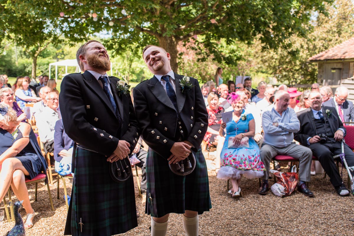 Photograph of groom and brother before wedding ceremony at Ratsbury Barn in Kent