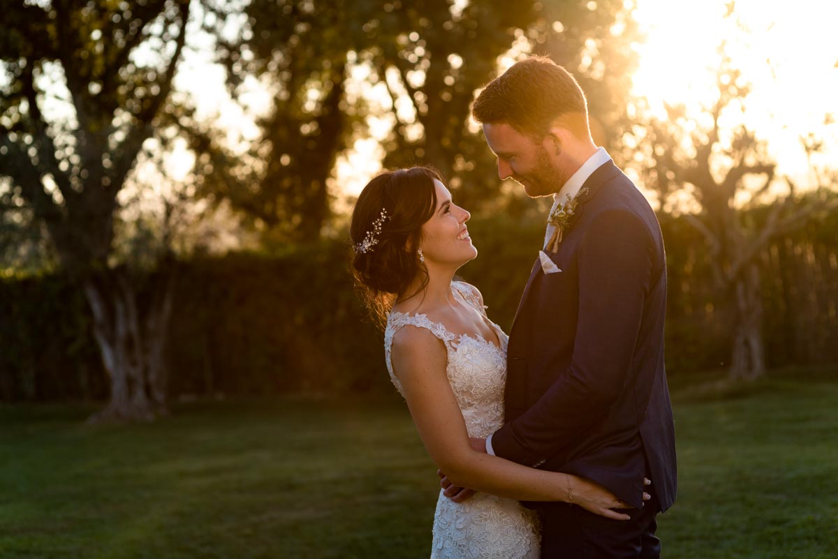sun set photograph of matt and rebecca at their wedding at castell d'emporda