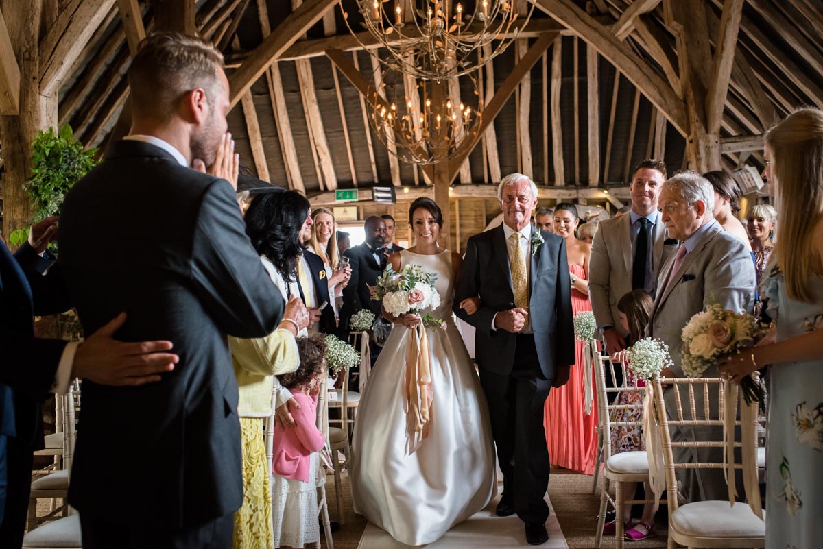 Emotional moments for Sarah and Craig during their Odo's Barn wedding ceremony