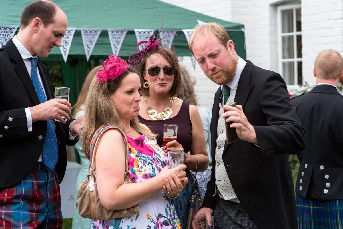 Canterbury wedding Photography, guests enjoying drinks at hannah and Matthews wedding