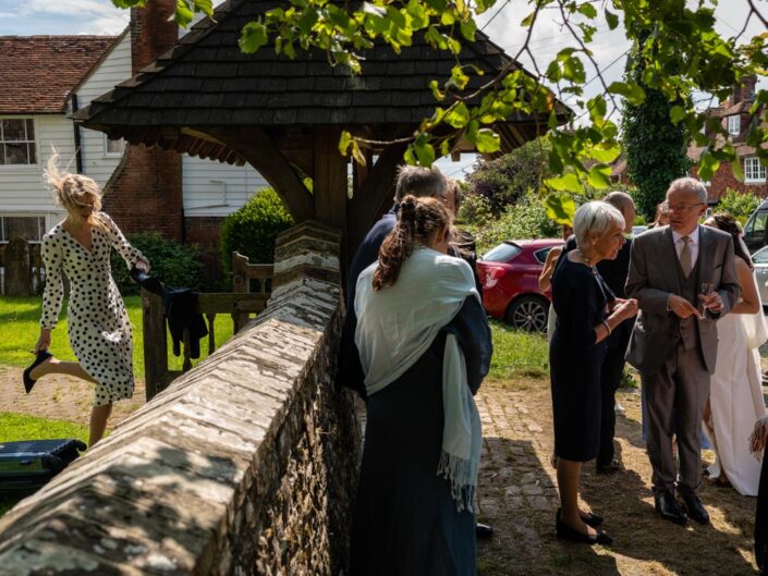 wedding photography best of 2021 photograph of wedding guests at clare and richards kent church wedding