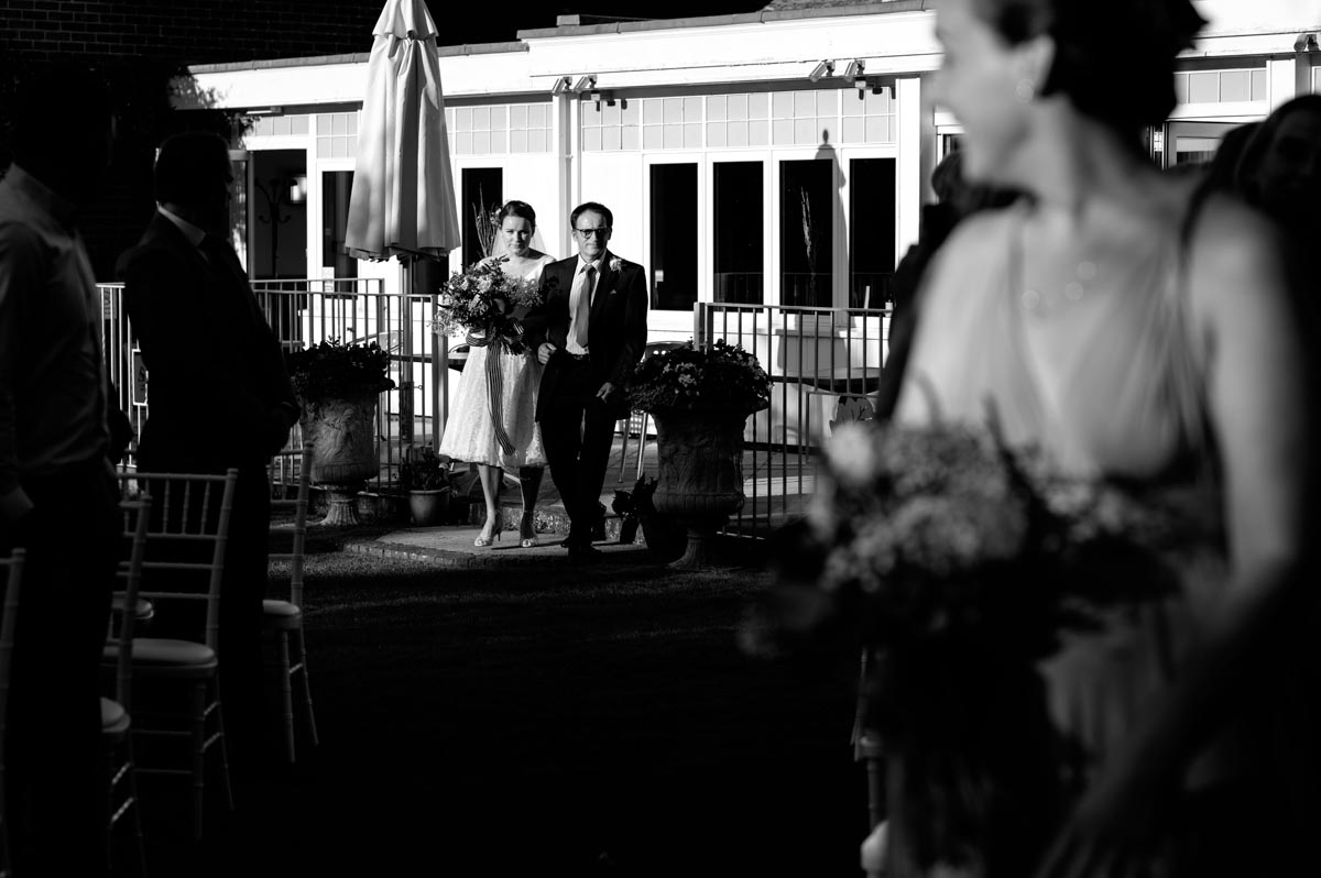 wedding photography best of 2021 photograph of imogen and her dad walking down the aisle at kent wedding