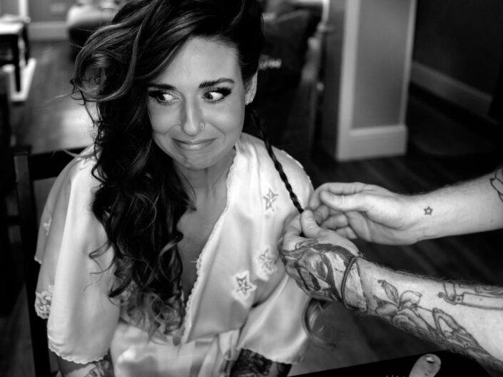 wedding photography best of 2021 photograph of bride haing hair braided before her kent wedding at wilderness venue