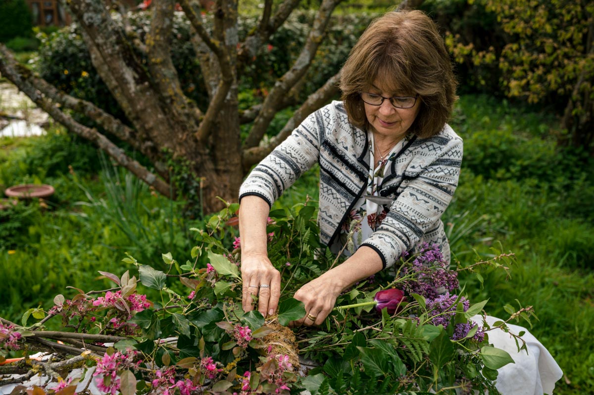 Lin puts together a bouquet during our Day in the Life Photography session