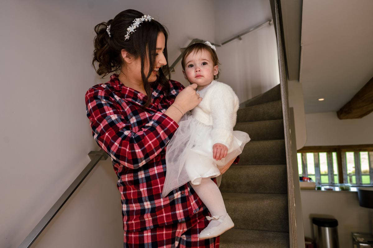 Bride and her daughter getting ready before her wedding