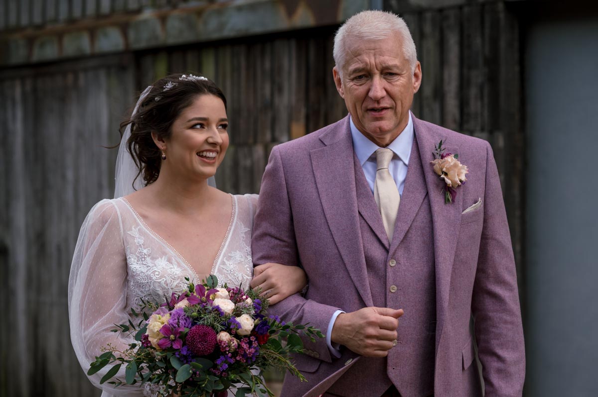 Bride and dad at The Oak barn, Frame Farm wedding venue just before ceremony