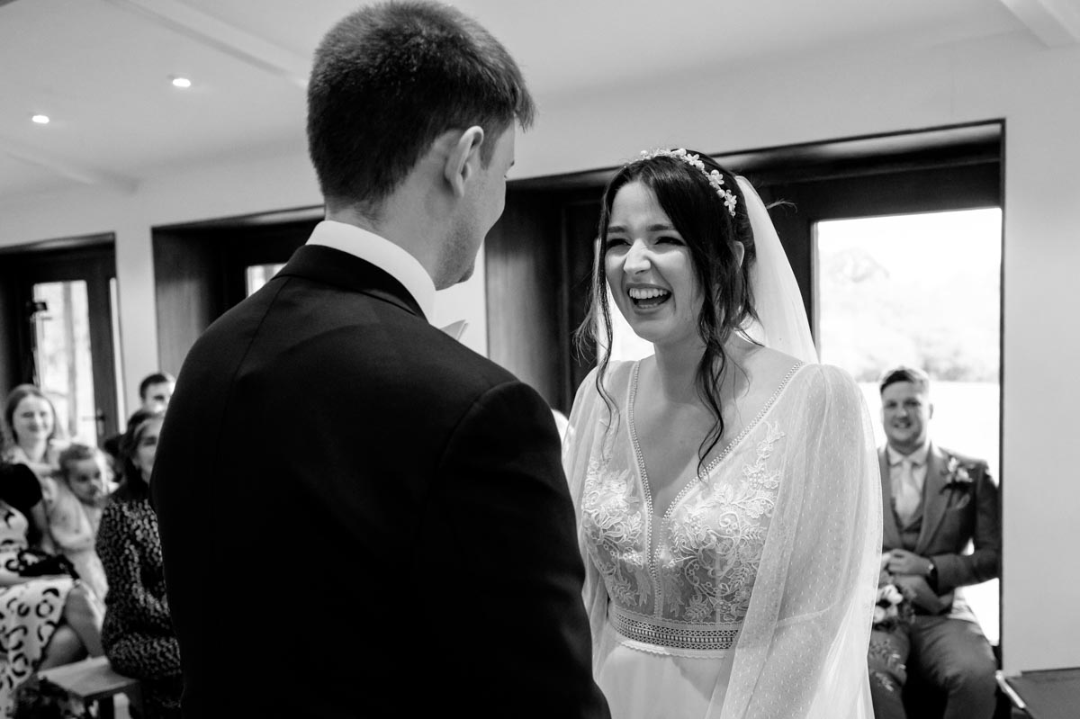 The Oak Barn, Frame Farm wedding of Sophia and Will during their ceremony