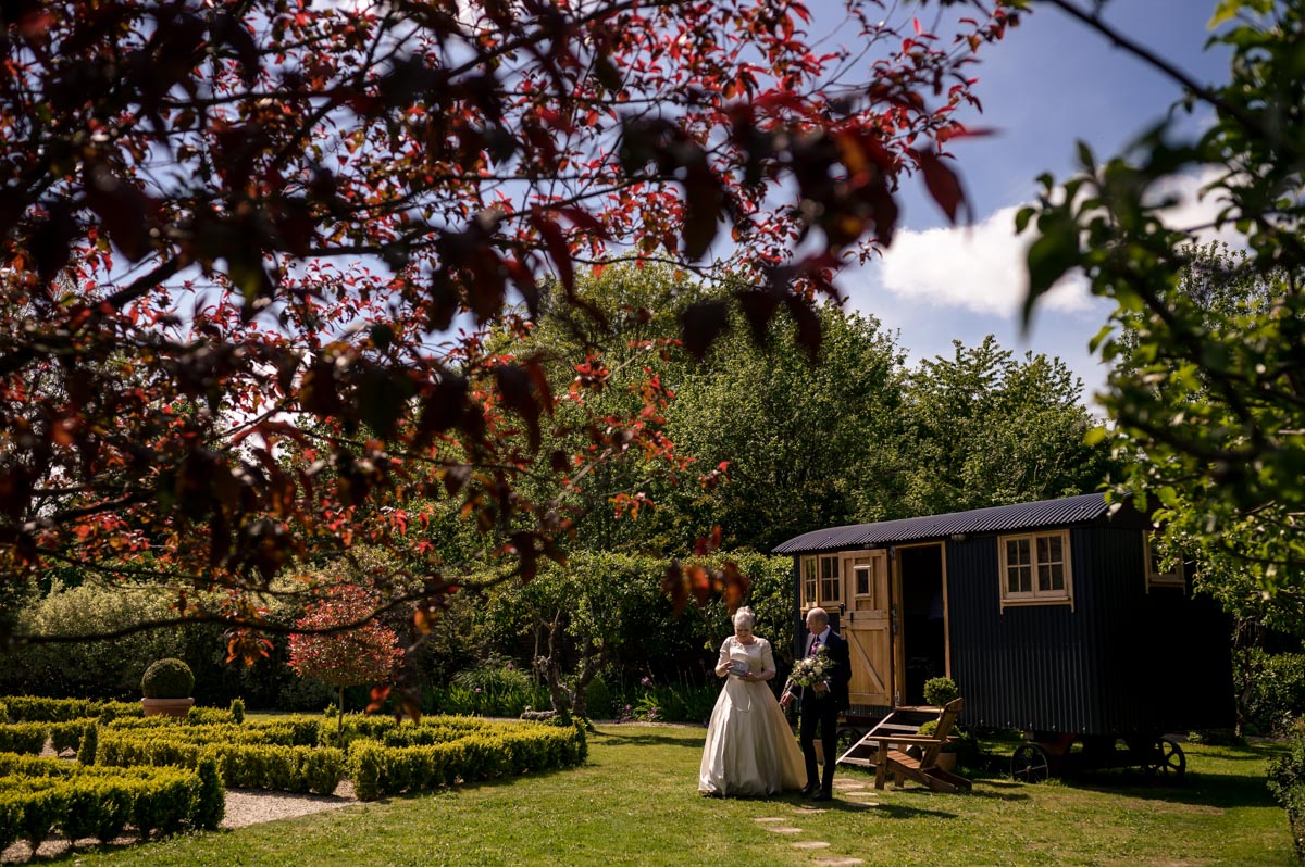 wedding photography at the secret garden at Tony and Rachels outdoor ceremony