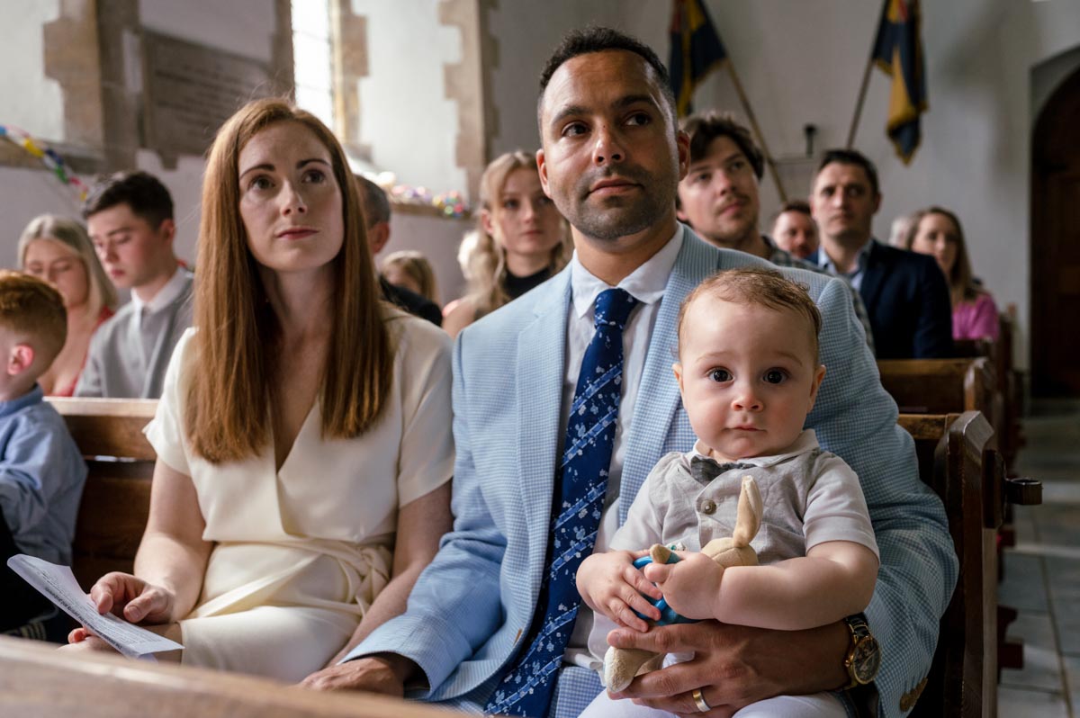 Photograph of Rupert and family in church during his christening in Kent