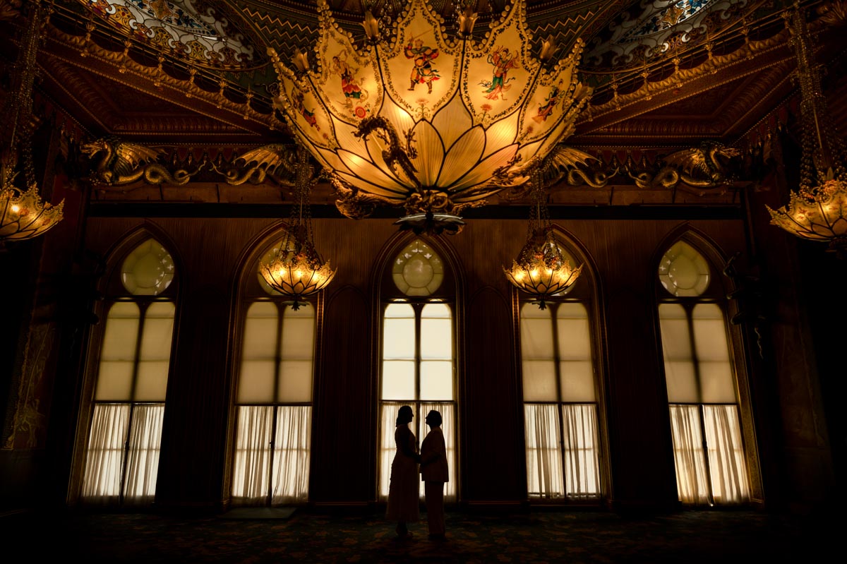 Portrait of couple in music room at Brighton Royal Pavillion wedding