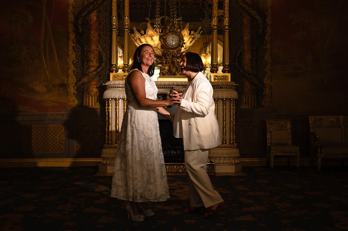 Donna and Sharon photographed in the Music room at Brighton Royal pavillion on their wedding day
