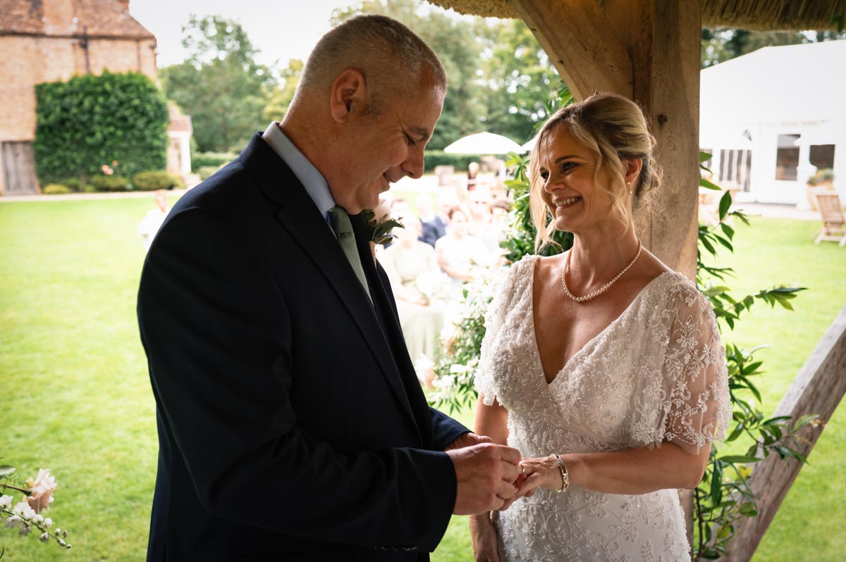 westenhanger castle wedding photography -lara and phil exchange rings