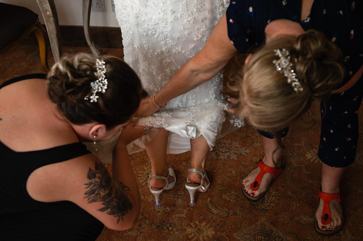 Westenhanger wedding. Lara and has her dress and shoes adjusted