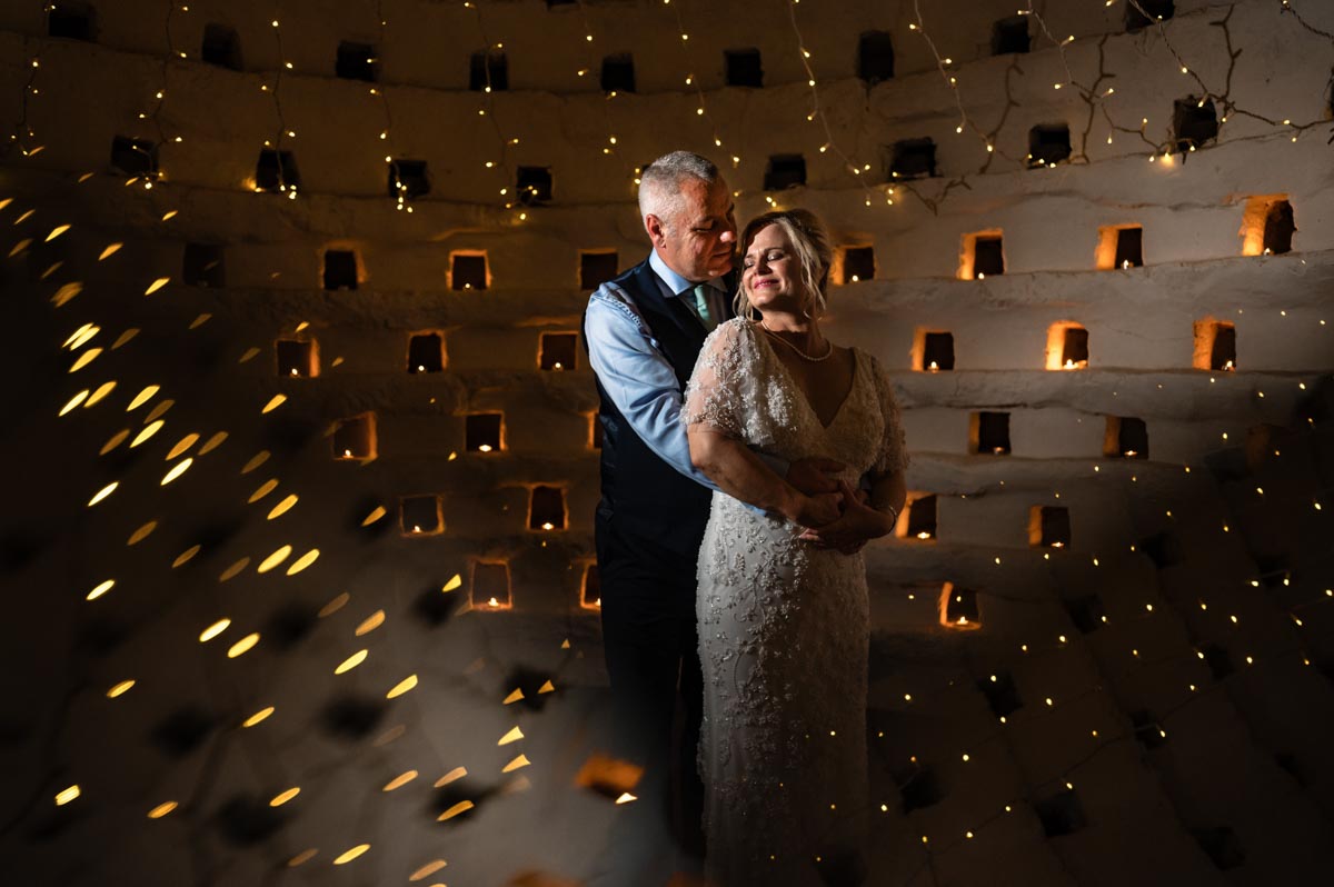 portrait of lara and phil in dovecote at westenahnger castle wedding venue
