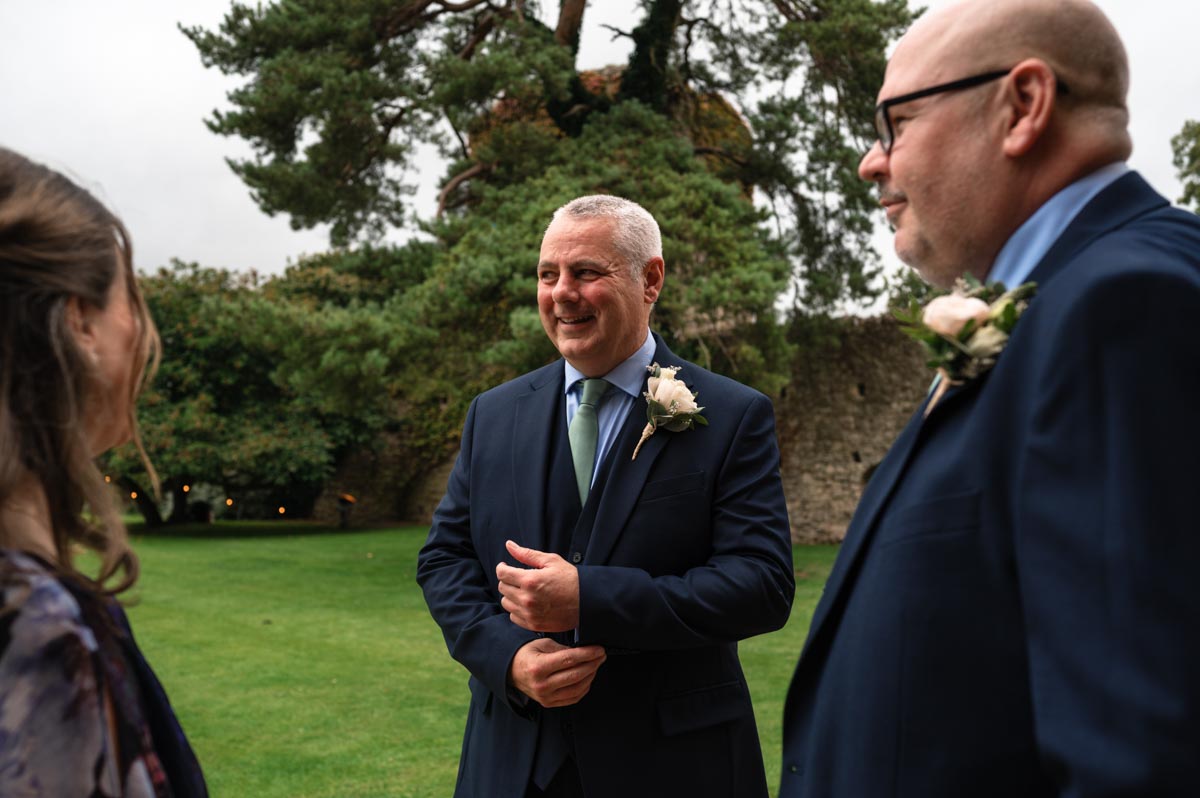 Groom photographed before his wedding ceremony at westenhanger castle in kent