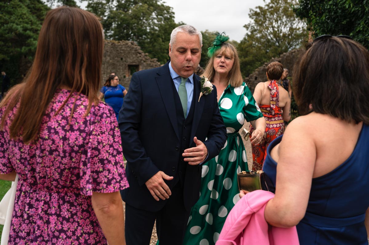 groom and guests at westenhanger castle wedding