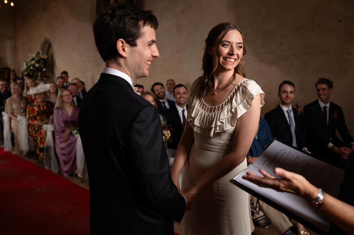 Bilsington Priory wedding Photography . Poppy and Pablo take their wedding vows