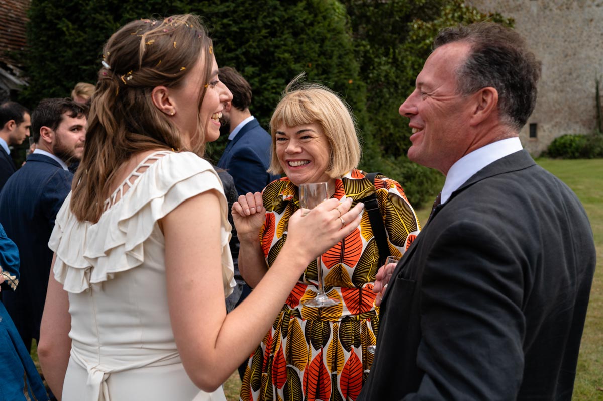 Bilsington Priory wedding photography. Poppy and guests during reception
