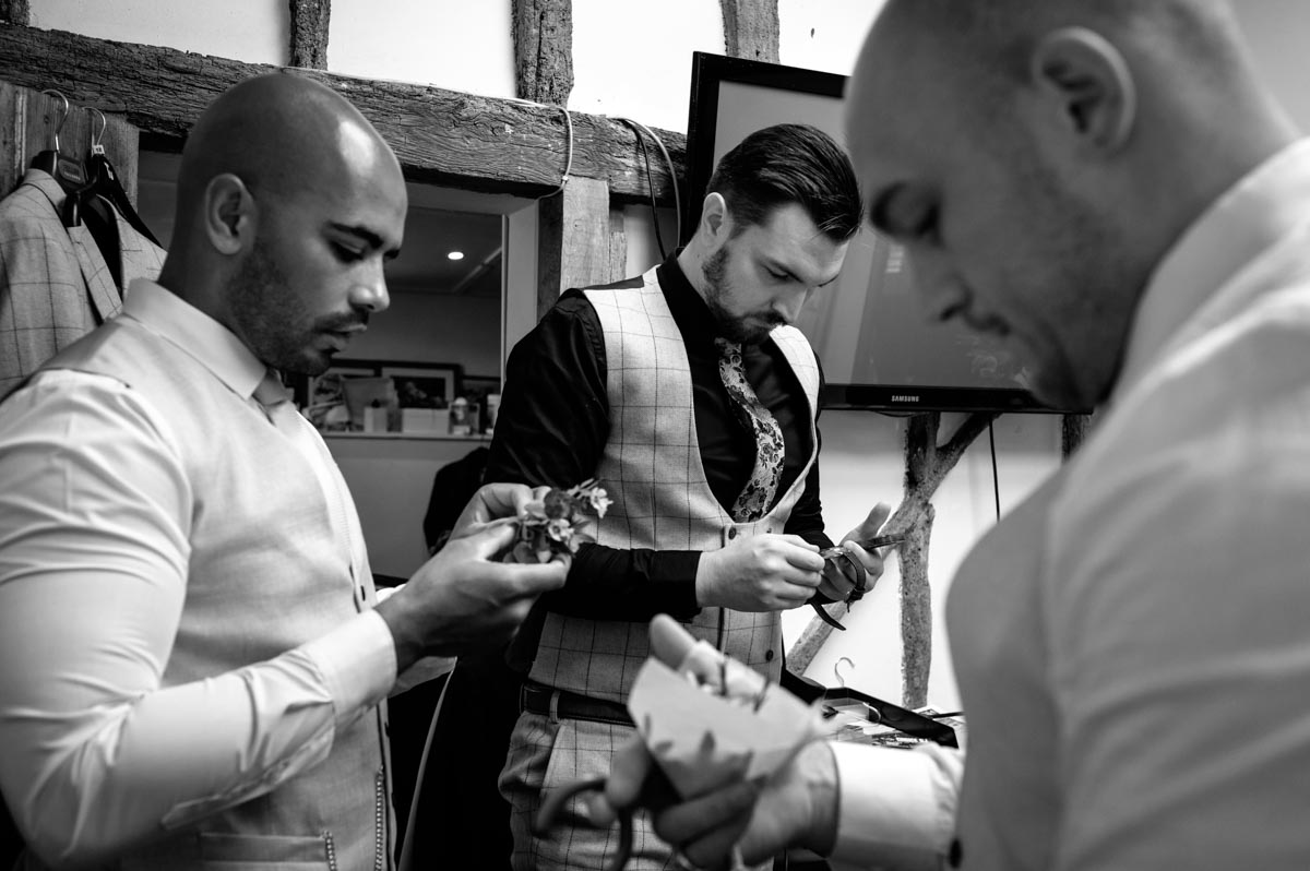 Groomsmen getting ready at swallows oast wedding
