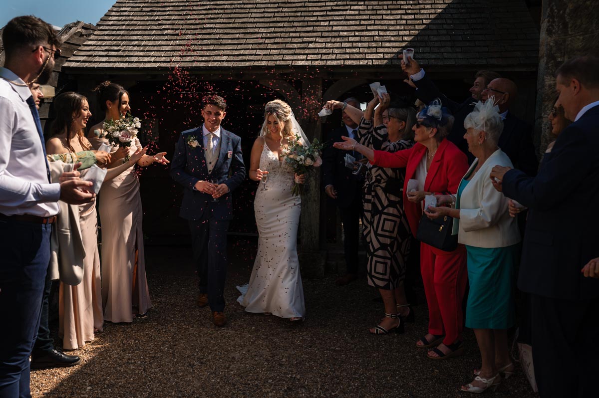 Swallows oast wedding photography. Sarah and James confetti throw