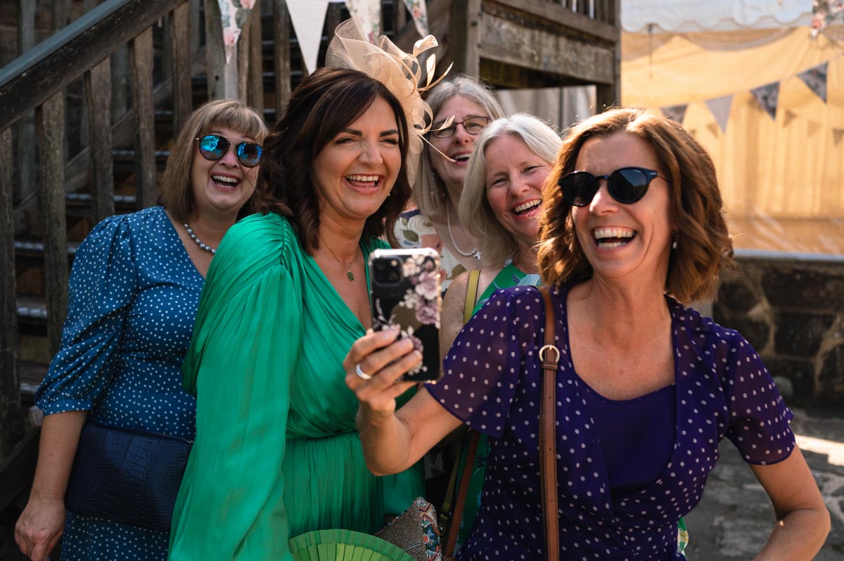 Grooms mum and friends photographed at swallows oast wedding