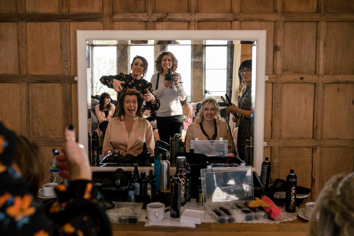 How I approach photographing your wedding day. Laughs sahred with bride and her mum getting ready.
