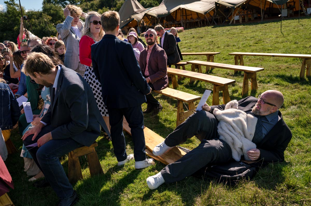 Sarah and Matthews wedding at Little Bayham. The bench couldn't hold the weight of all the guests.
