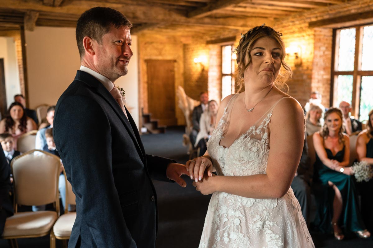wedding photography kent. westenhanger castle wedding. david and paige photographed during their ceremony