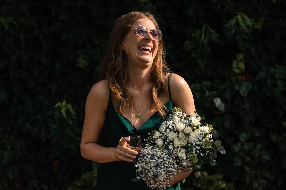 bridesmaids laughing at paige and davids wedding