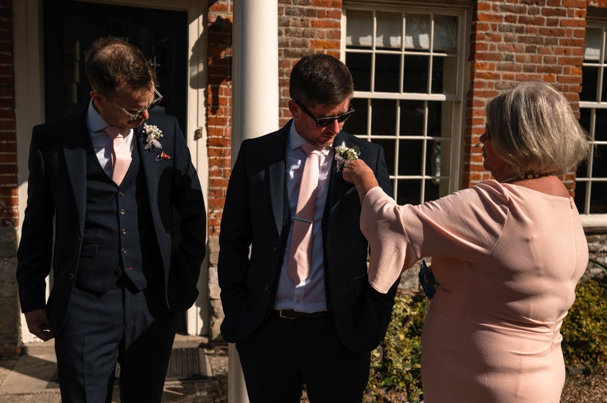 wedding photography at westenhanger castle. david and his guests