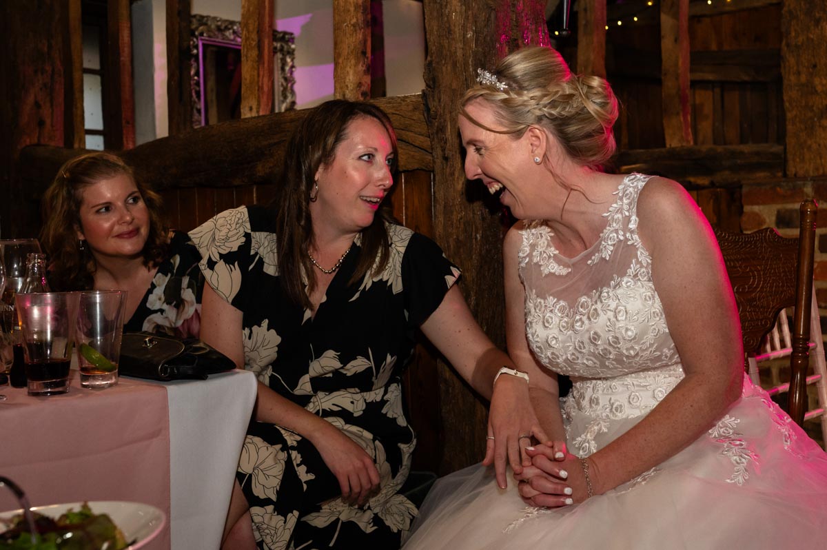 Bride and her bestwoman at wedding reception