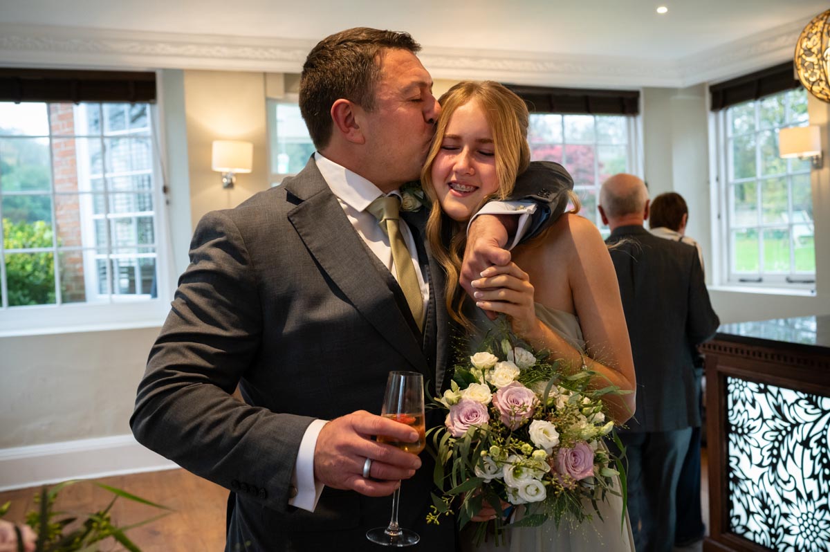 Groom and daughter at Chilston Park Hotel wedding
