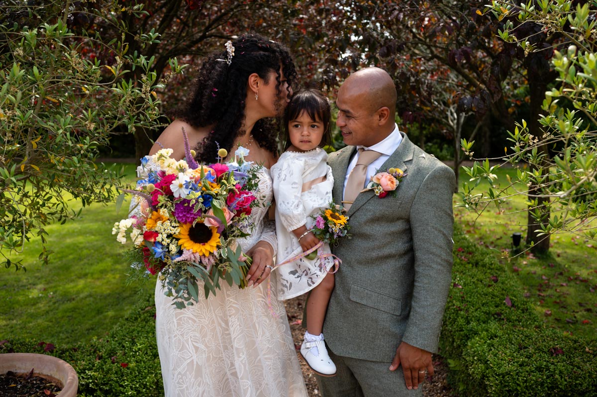 Informal family wedding photo at the Secret Garden in Kent. A taste of my 2024 weddings.