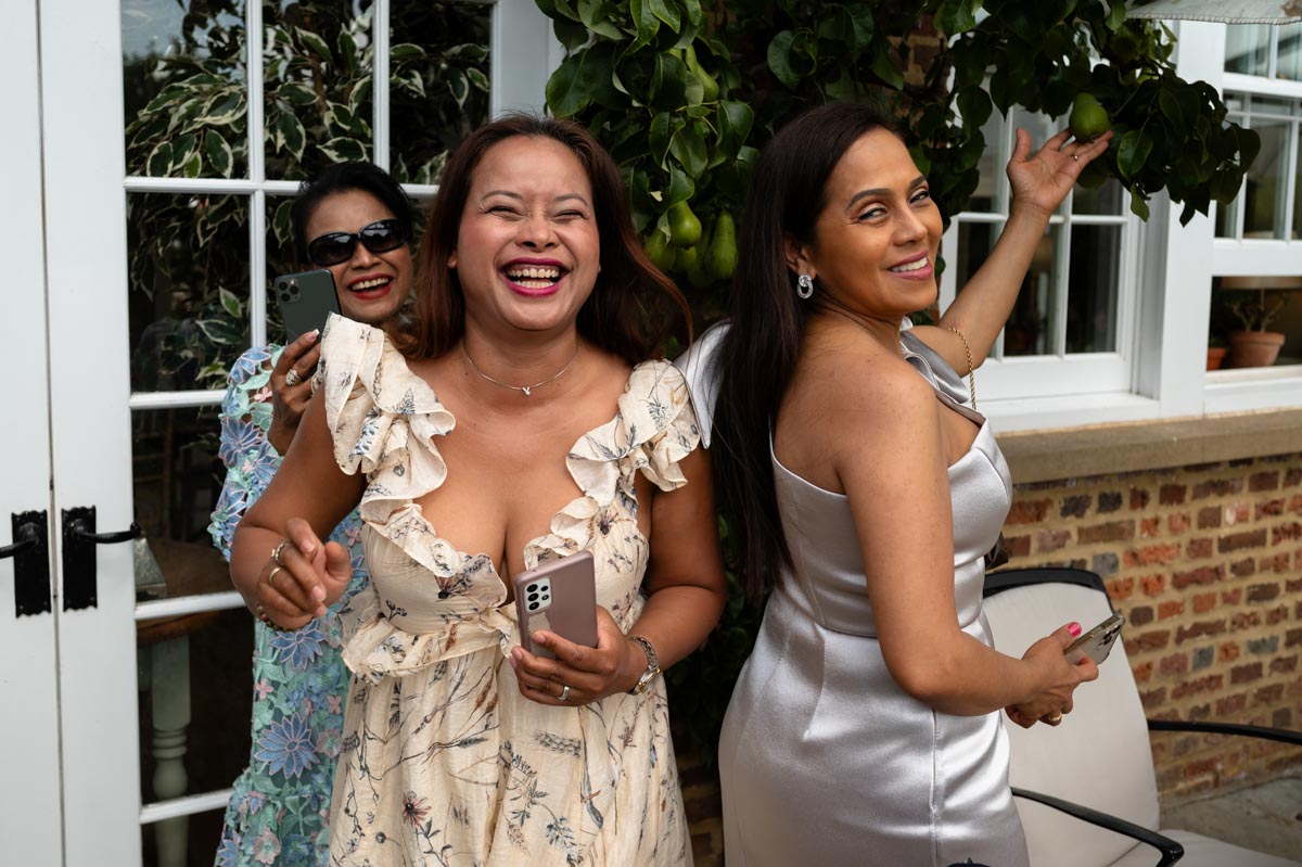 Wedding guests enjoying reception at The Secret garden in Kent.