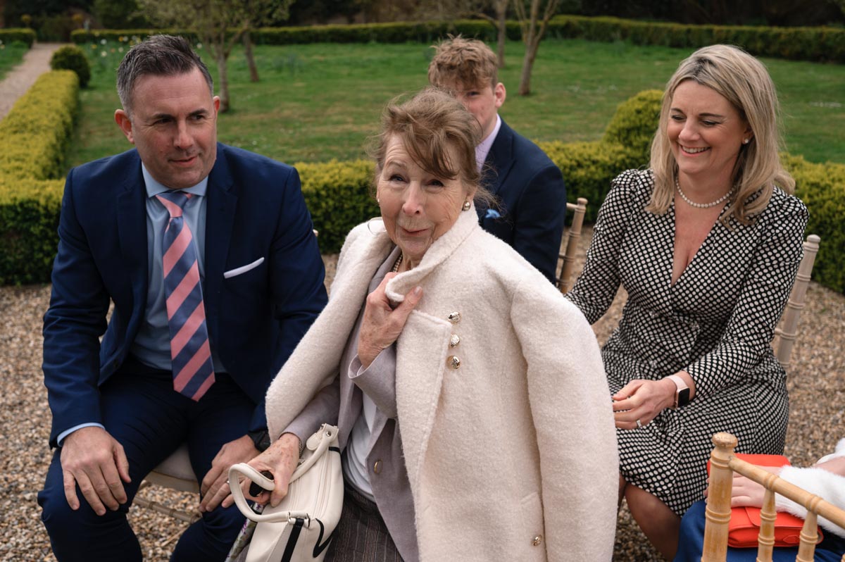 A taste of my 2024 weddings. Guest photographed looking a little chilly